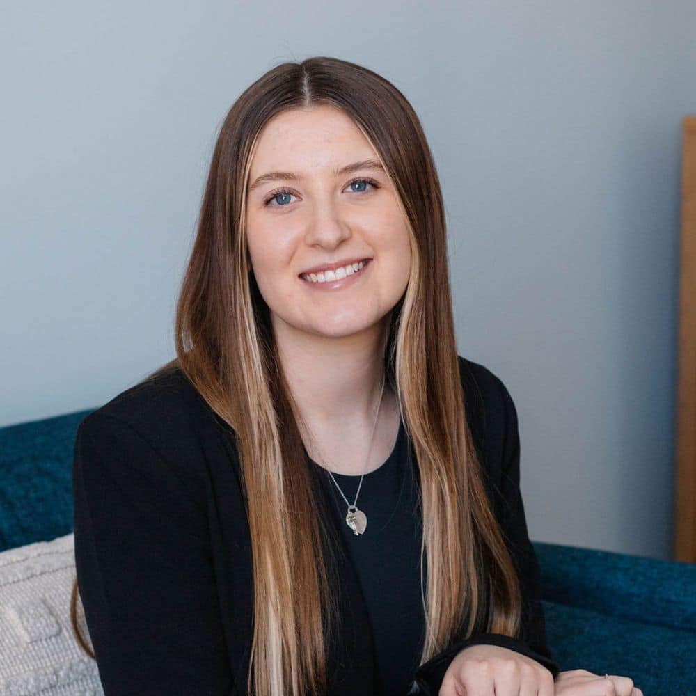 Person with long hair, wearing black