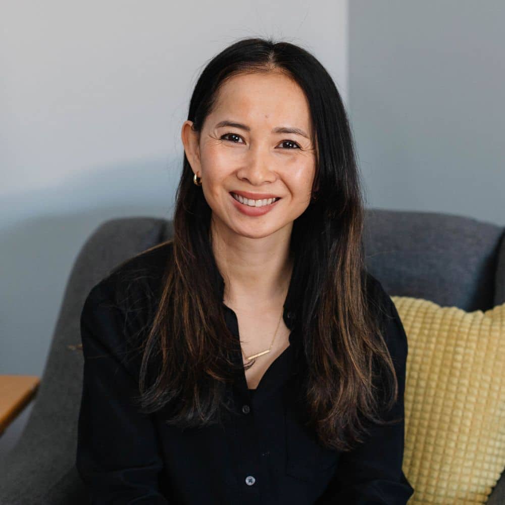 Person sitting on a couch.