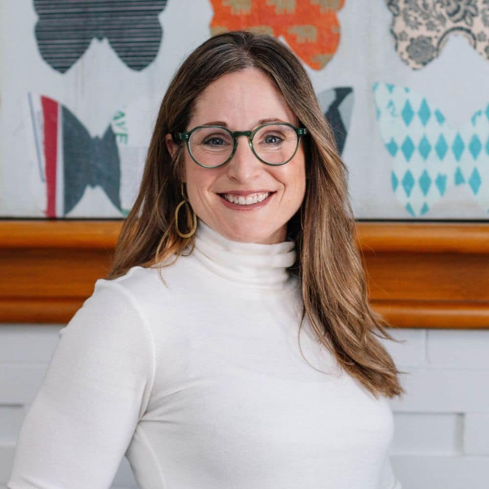 Person with long hair in white